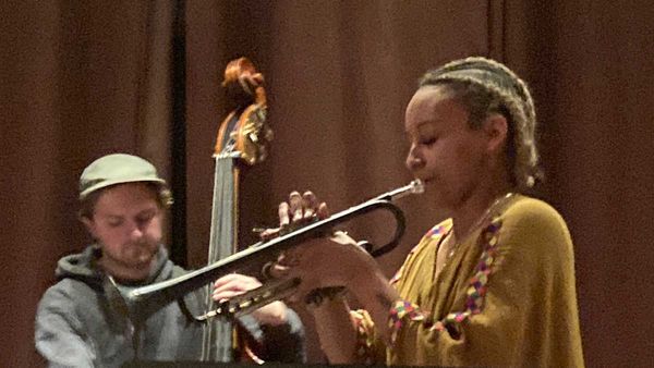 Dan Howard on bass, Feven Kidane on trumpet